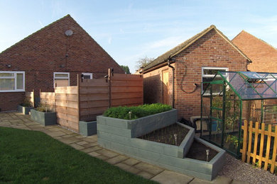 Photo of a medium sized contemporary back terrace in Cambridgeshire.