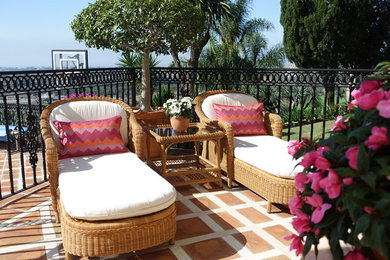 Photo of a large mediterranean terrace in Other with an awning.