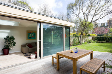 This is an example of a contemporary back terrace in Other with no cover.