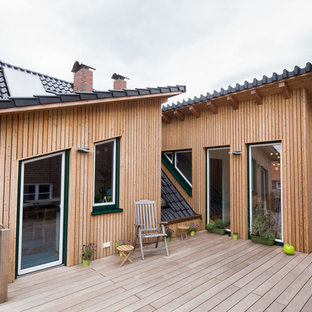Unbedeckte, Mittelgroße Moderne Dachterrasse im Dach mit Kübelpflanzen in Hamburg