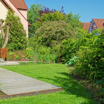 Auffrischung eines Hausgartens mit 2 Terrassen