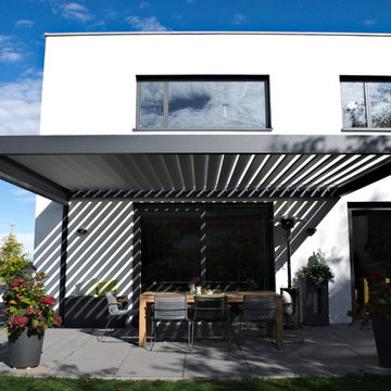 Frei zu öffnendes Terrassendach für ein Einfamilienhaus in München
