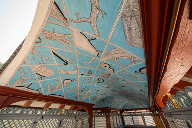 フランクフルトにあるコンテンポラリースタイルのおしゃれな屋上のデッキ (噴水、張り出し屋根) の写真