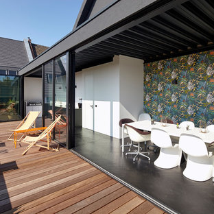 Unbedeckte, Mittelgroße Moderne Dachterrasse im Dach mit Steg in Köln