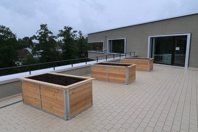 Ispirazione per una terrazza stile marinaro di medie dimensioni e sul tetto