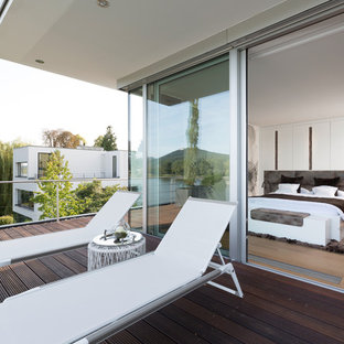 Mittelgroße, Überdachte Moderne Dachterrasse im Dach in Köln