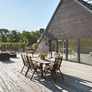 Example of a large danish rooftop rooftop deck design in Stockholm with no cover