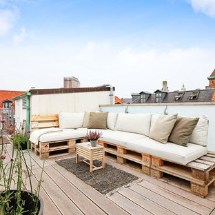 Esempio di una terrazza stile shabby sul tetto e sul tetto con un giardino in vaso e nessuna copertura