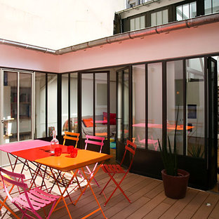 Cette photo montre une terrasse industrielle de taille moyenne avec une cour et aucune couverture.