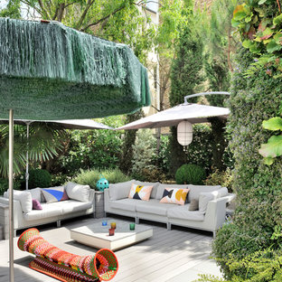 Idée de décoration pour un mur végétal de terrasse bohème.