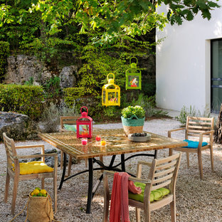 Aménagement d'une terrasse arrière campagne de taille moyenne avec aucune couverture.