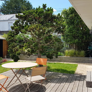 Idée de décoration pour une terrasse arrière design.