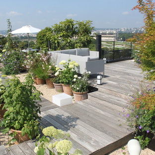 Esempio di una terrazza stile shabby con un giardino in vaso