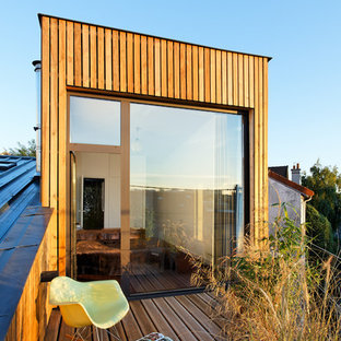 Cette image montre un toit terrasse sur le toit design de taille moyenne.