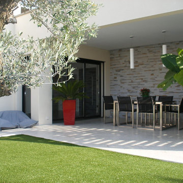 Maison contemporaine plain-pied avec patio