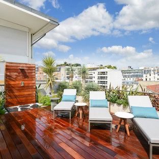 Aménagement d'une terrasse sur le toit contemporaine avec aucune couverture.