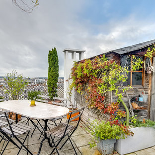 Inspiration pour une terrasse sur le toit méditerranéenne de taille moyenne avec aucune couverture.