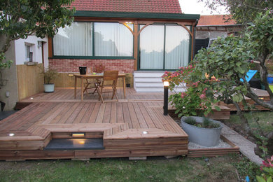 Exemple d'une terrasse craftsman.