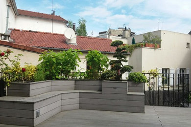 Exemple d'un toit terrasse tendance.
