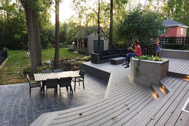 Patio - contemporary patio idea in Montreal