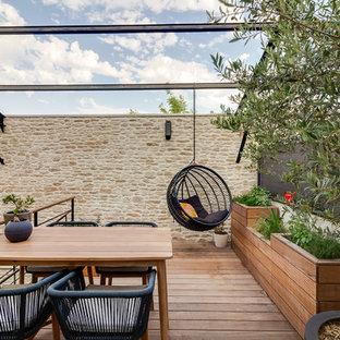 Exemple d'une terrasse sur le toit tendance.
