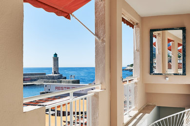 Photo of a medium sized mediterranean front patio in Marseille with an awning.