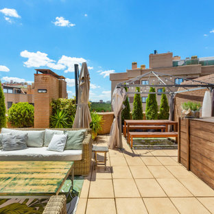 Inspiration pour une terrasse bohème avec des solutions pour vis-à-vis.