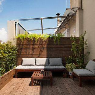 Diseño de terraza exótica, de tamaño medio, sin cubierta, en azotea, con jardín de macetas