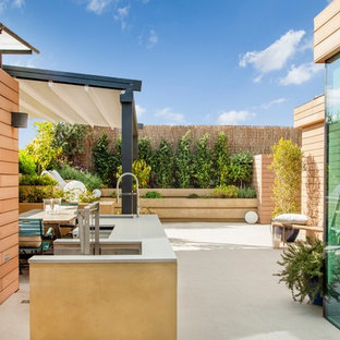 Inspiration for a medium sized industrial terrace in Barcelona.
