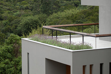Modelo de terraza minimalista grande en azotea