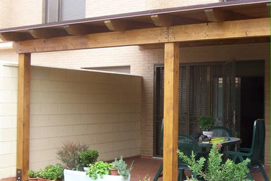 This is an example of a country porch design in Other.