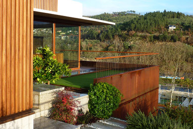 Imagen de terraza contemporánea de tamaño medio sin cubierta en azotea
