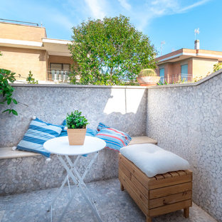Ispirazione per una piccola terrazza stile marinaro con nessuna copertura