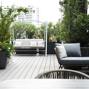 Esempio di una terrazza tradizionale sul tetto e sul tetto con un giardino in vaso e nessuna copertura