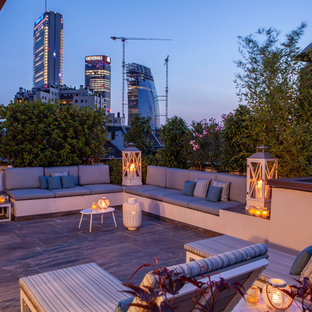 Esempio di una terrazza minimal sul tetto e sul tetto con nessuna copertura