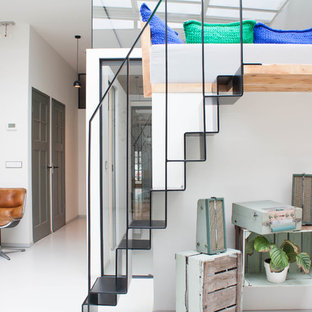 Inspiration for a small contemporary metal straight staircase in Other with metal risers.