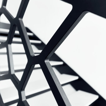 Stufen in Betonoptik  und Voronoi Geländer in einem stylischen Büro
