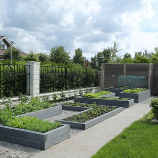 Esempio di un orto in giardino contemporaneo esposto in pieno sole di medie dimensioni in estate con ghiaia