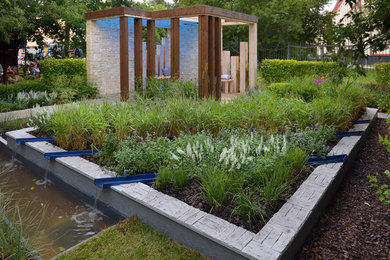 Idéer för att renovera en funkis trädgård, med en fontän