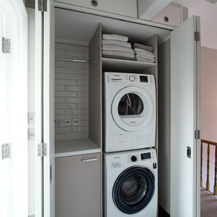 75 Beautiful Laundry Cupboard with a Stacked Washer and Dryer Ideas ...