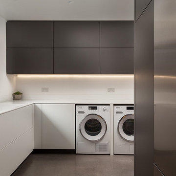 Contemporary utility room: matte grey, white, stainless steel