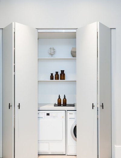 Contemporary Laundry Room by Salu-tions Project Management