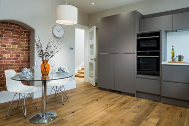 This is an example of a large modern utility room in London.