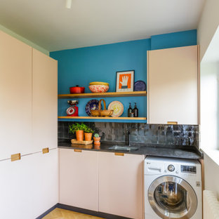 Photo of an eclectic utility room in Hertfordshire.