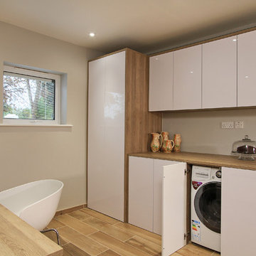 Rotpunkt Wood & High Gloss Kitchen in Bardolia & Zerox HL Icy White.