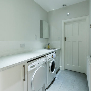 utility room in the middle with cloakroom at the end