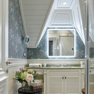 Traditional bathroom in Moscow with louvered cabinets, white cabinets, multi-coloured walls, an undermount sink, beige floor and green benchtops.