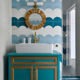 Contemporary bathroom in Moscow with recessed-panel cabinets, turquoise cabinets, blue tile, white tile, a vessel sink, blue floor and turquoise benchtops.