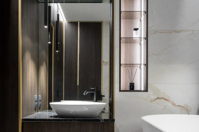 Example of a mid-sized trendy master multicolored tile and porcelain tile ceramic tile, multicolored floor and single-sink toilet room design in Other with flat-panel cabinets, brown cabinets, multicolored walls, a drop-in sink, solid surface countertops, black countertops and a floating vanity