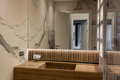 На фото: ванная комната в современном стиле с плоскими фасадами, коричневыми фасадами, инсталляцией, тумбой под одну раковину и подвесной тумбой